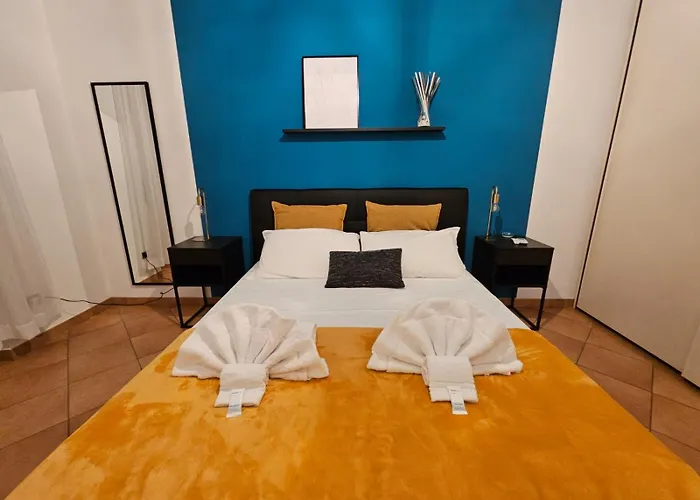 Giulios - By Be Your Apartment